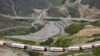 ARMENIA - Armenian lorries carriyng humanitarian aid for Nagorno-Karabakh are seen stranded near an Azerbaijani checkpoint set up at the entry of the Lachin corridor, July 30, 2023. 