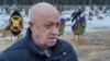 "Вагнер" менчик аскер компаниясынын негиздөөчүсү Евгений Пригожин Санкт-Петербурдагы көрүстөндө, 24-декабрь, 2022-жыл.