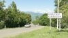 Armenia - A road sign at the entrance to the village of Kornidzor, June 7, 2022.