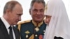 Ікона з Путіним та ікона зі Сталіним. На Донбасі вбито і чимало парафіян РПЦ