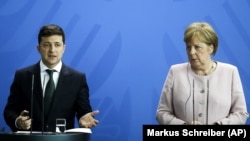 Президент України Володимир Зеленський (л) і канцлер Німеччини Анґела Меркель, архівне фото, 2019 рік