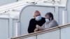 Пасажири стоять на палубі круїзного лайнеру Diamond Princess на пристані в Йокогамі, Японія, 10 лютого 2020 року