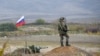 NAGORNO-KARABAKH -- A Russian peacekeeper patrols at the check point outside Askeran, November 20, 2020