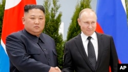 Ким Чен Ын и Владимир Путин 