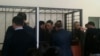 Подсудимых по делу «Таблиги Джамаат» заводят в зал суда. Астана, 22 января 2016 года.