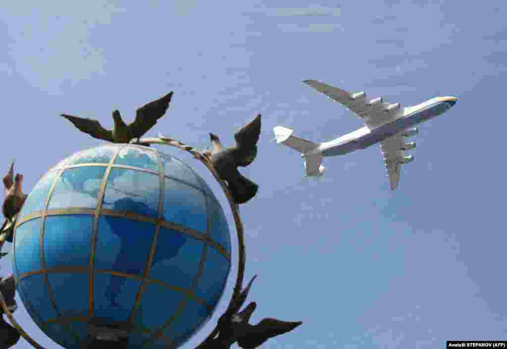 The world's largest transport aircraft, the Ukrainian Antonov An-225 Mria, flies over the Independence Day parade in Kyiv.