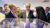 Șeful Agenției Internaționale pentru Energie Atomică, Rafael Grossi (stânga), vizitează sediul Organizației pentru Energie Atomică a Iranului din Teheran - aprilie 2025