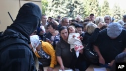 Орусиянын эвакуация болуп жаткан тургундары. 